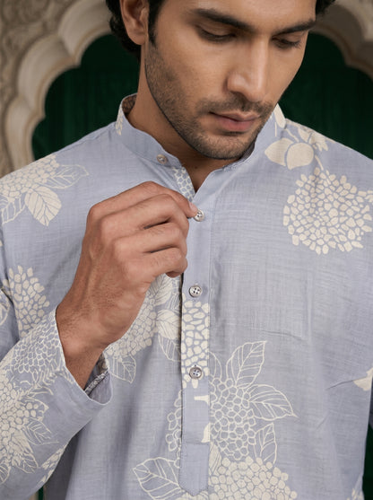 Sky blue linen blend kurta with floral print and modern look